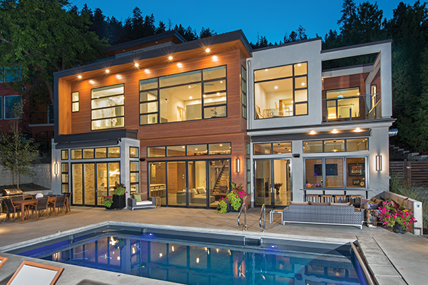 Contemporary windows and doors invite maximum views and natural light into the home. | Photo courtesy of Colin Jewall Photo Studios, Inc.