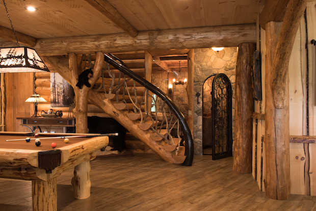log cabin game room by Golden Eagle & Timber Homes